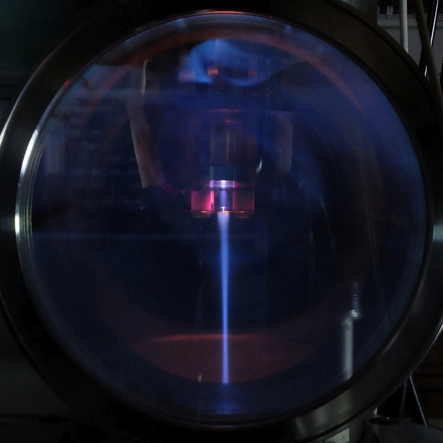 Photo of 100mA electron beam generated by single cavity ECR source