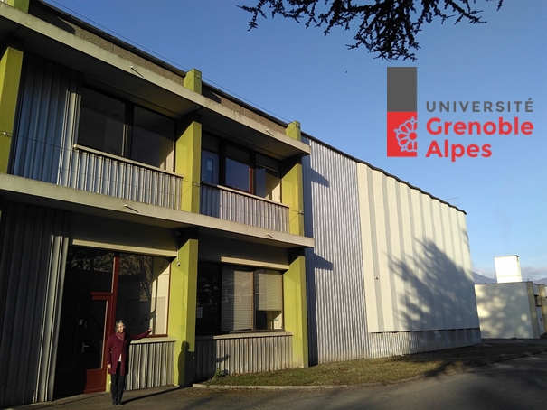 Photo of the Polygon Physics building and the UGA logo